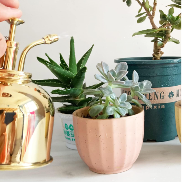 Vintage brass tone floral mister